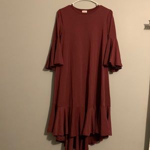 Bell sleeved dress with big ruffle around the bottom